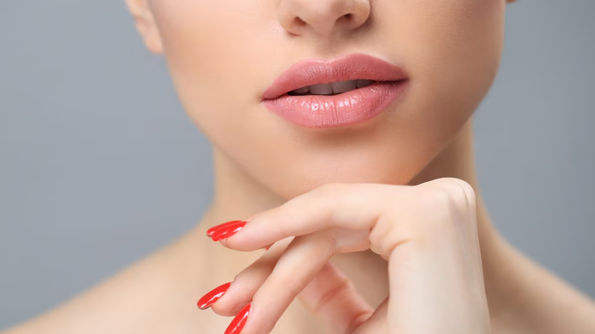 Apply coconut oil on lips like this, your lips will become soft and pink.