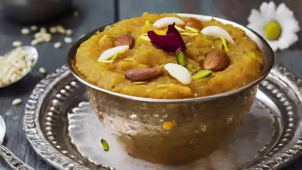 food news make besan halwa for lord ganesha on vinayak chaturthi 2025 prepare instant bhog with this easy recipe1