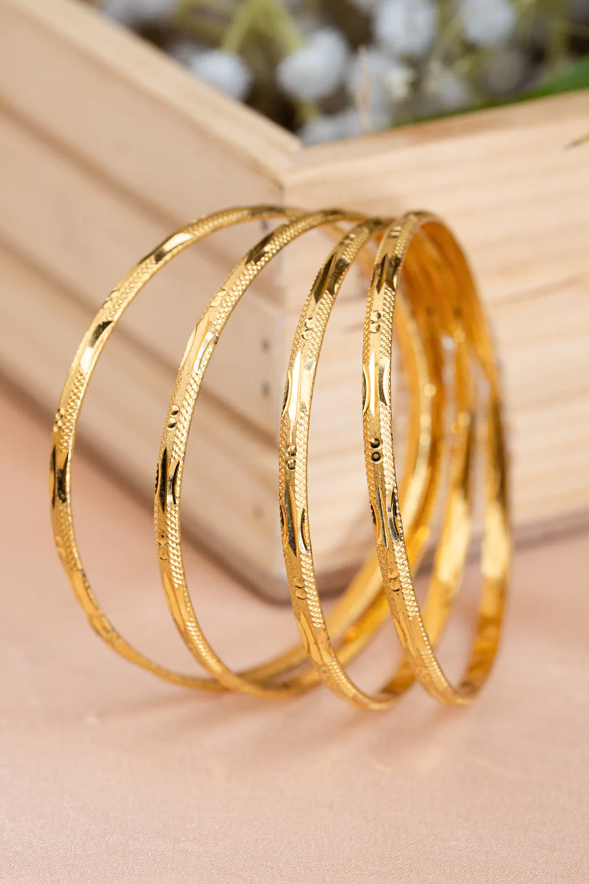 these gold plated bangle designs give a royal look to your hand22