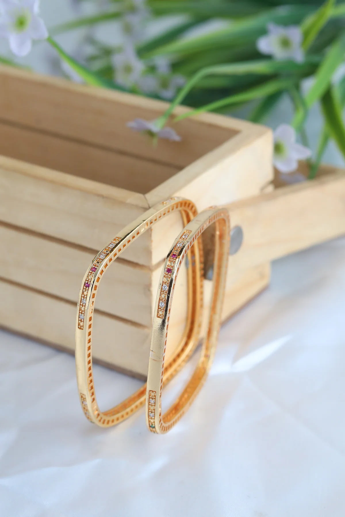 these gold plated bangle designs give a royal look to your hand33