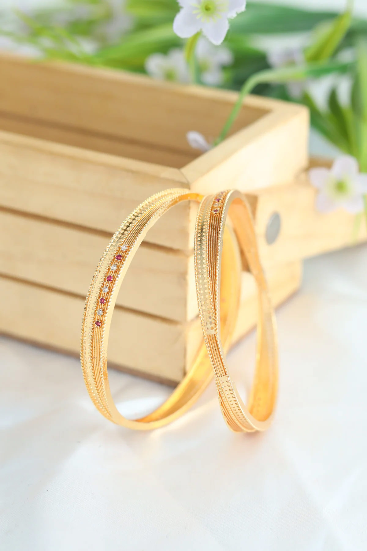 these gold plated bangle designs give a royal look to your hand44