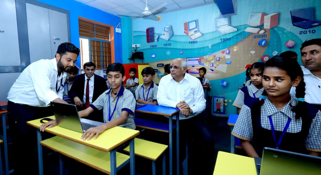 CM Patel in school with childrens 1024x560 1